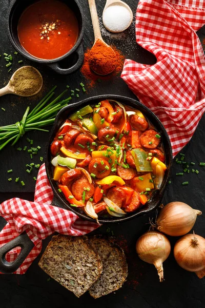 Stewed Pepper Sausage Tomatoes Cast Iron Skillet Black Background Top — Stock Photo, Image