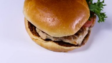 Taze iştah açıcı hamburger dönen arka plan.