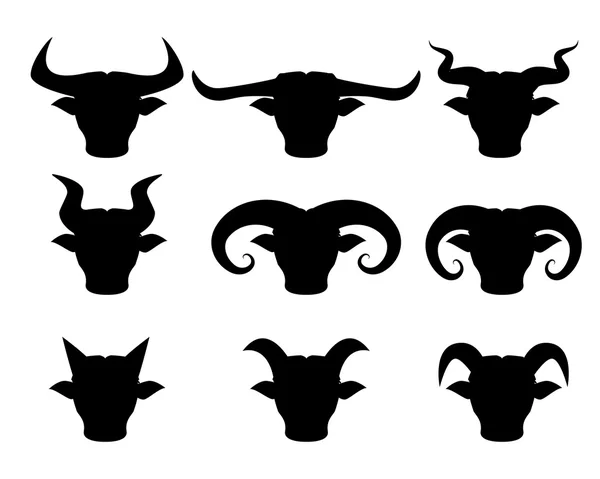Bufalo e Bull icone testa in silhouette — Vettoriale Stock