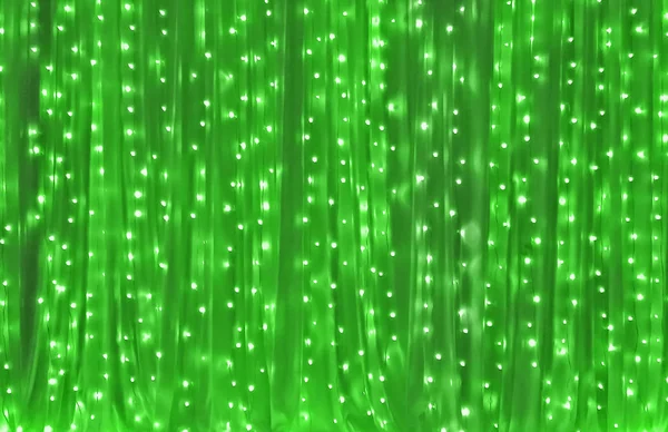Płachta z wielu żarówki jako tło zielony — Zdjęcie stockowe
