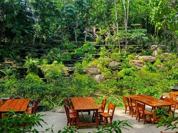 Restaurant in green jungle garden concept with no people