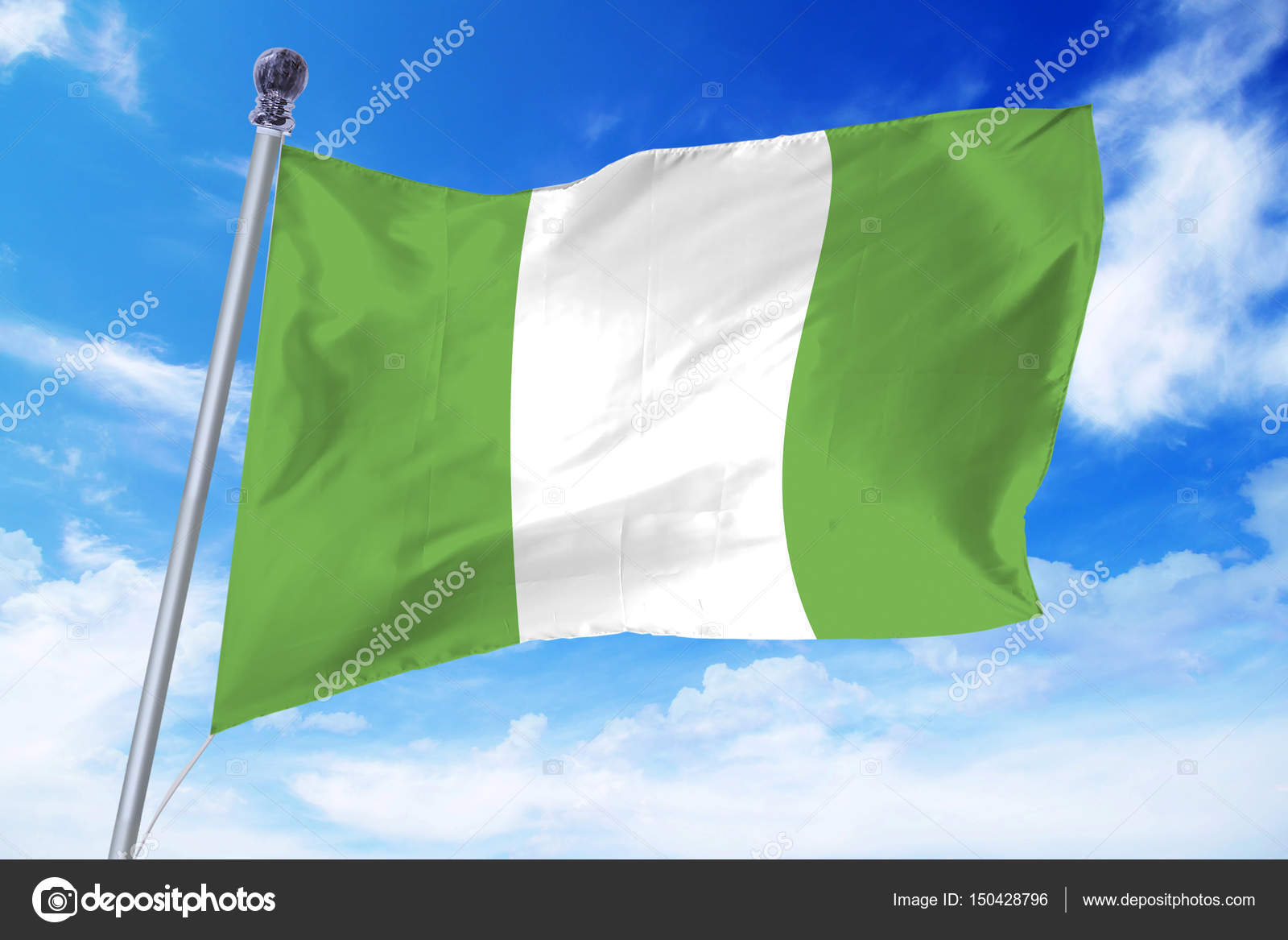 Flag of Nigeria developing against a clear blue sky — Stock Photo © DatsenkoMarina #150428796 Flag of Nigeria developing against a clear blue sky — Stock Photo © DatsenkoMarina #150428796
