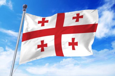 Masmavi bir gökyüzü karşı gelişen Gürcistan bayrağı