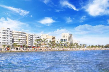 Beautiful view of the main street of Larnaca and Phinikoudes beach in Cyprus clipart