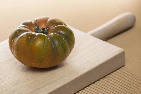 Raf tomato on a wooden board — 스톡 사진