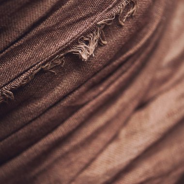 Çarşaf buruşmuş kahverengi arka plan. Kapat. 
