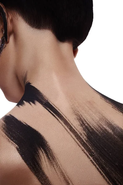 Brunette Woman with Paint Strokes on her Back — Stock Photo, Image