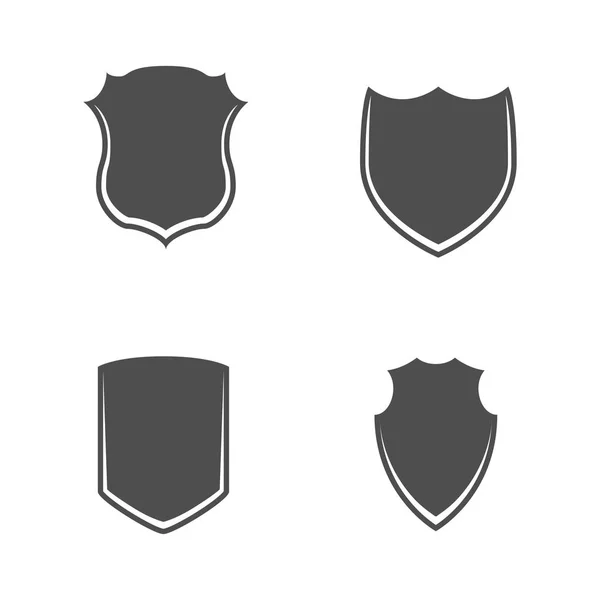 Conjunto de escudos vectoriales blanco y negro — Vector de stock