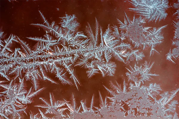 Abstrato fundo textura gelo padrões em vidro, foto matizada — Fotografia de Stock