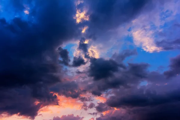 Natural background of sky with clouds after a storm at sunset — Stock Photo, Image