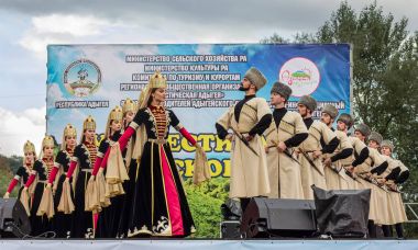 The state academic ensemble of folk dance of Adygeya Nalmes at the festival of Circassian cheese in the Republic of Adygea clipart
