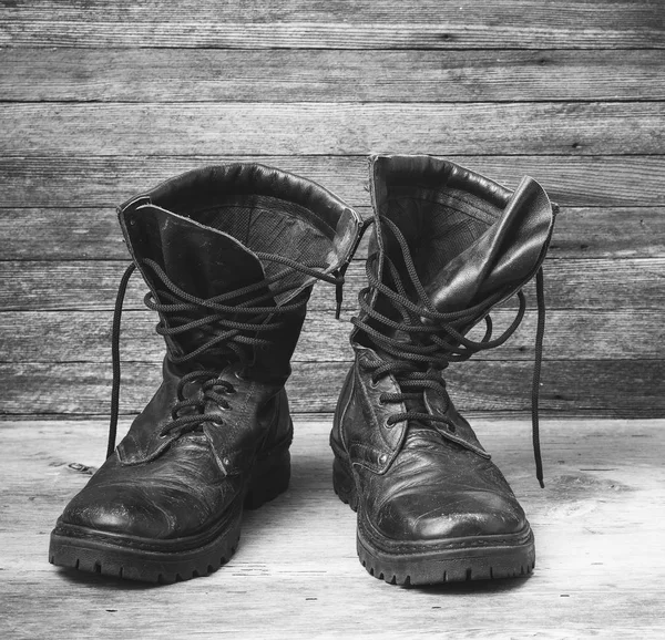 Old leather black military ankle boots closeup — Stock Photo, Image