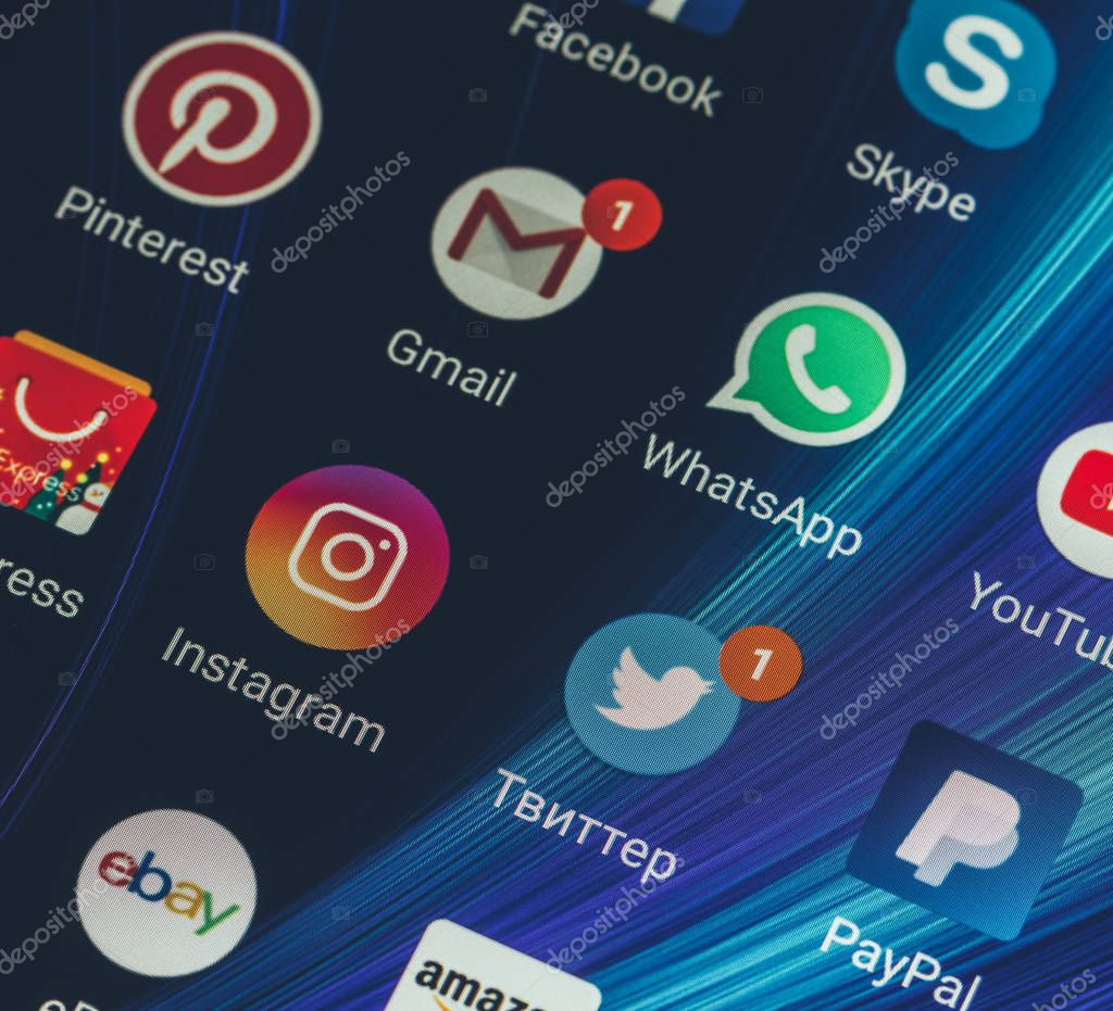 Adygea, Russia - January 3, 2018: WhatsApp, YouTube, instagram, Facebook, Skype and other app icons on the smartphone screen Xiaomi