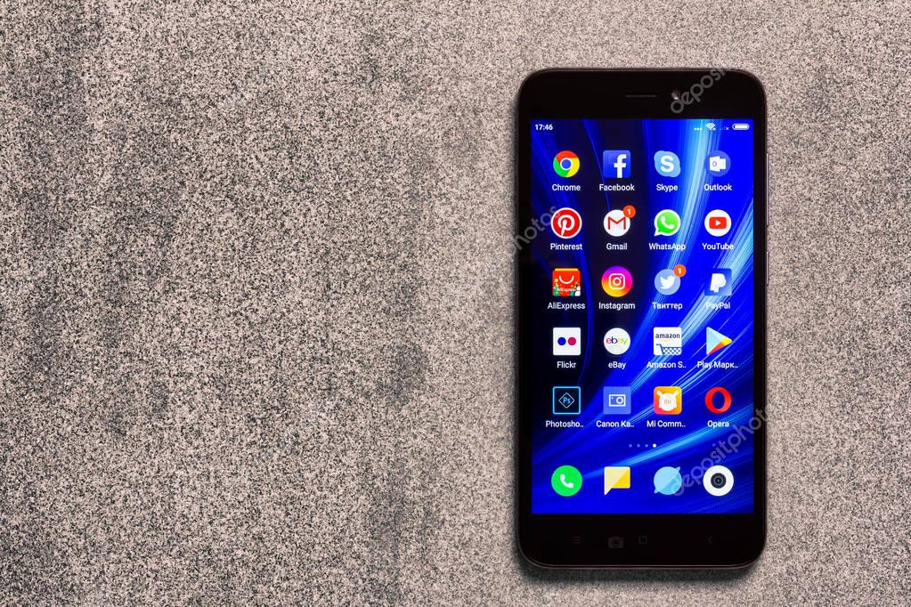 Adygea, Russia - January 3, 2018: app icons WhatsApp, YouTube, instagram, Facebook, Skype, Amazon, Twitter, pinterest and other on the screen of the smartphone Xiaomi