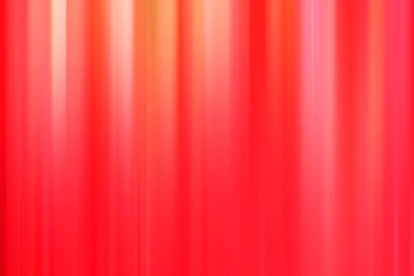 縦の赤い縞のある抽象的な背景をぼかした写真 — ストック写真