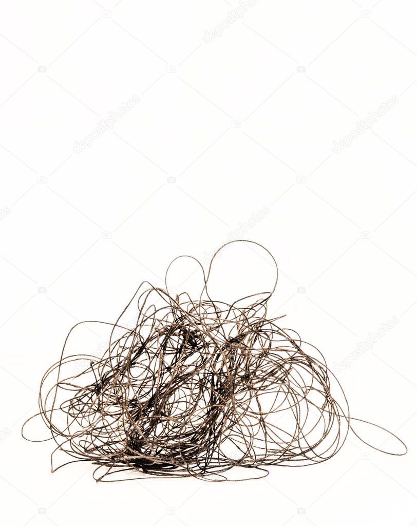 a bundle of tangled black threads on a white background concept of a confusing situation, mock up for text, for phrases, for lettering