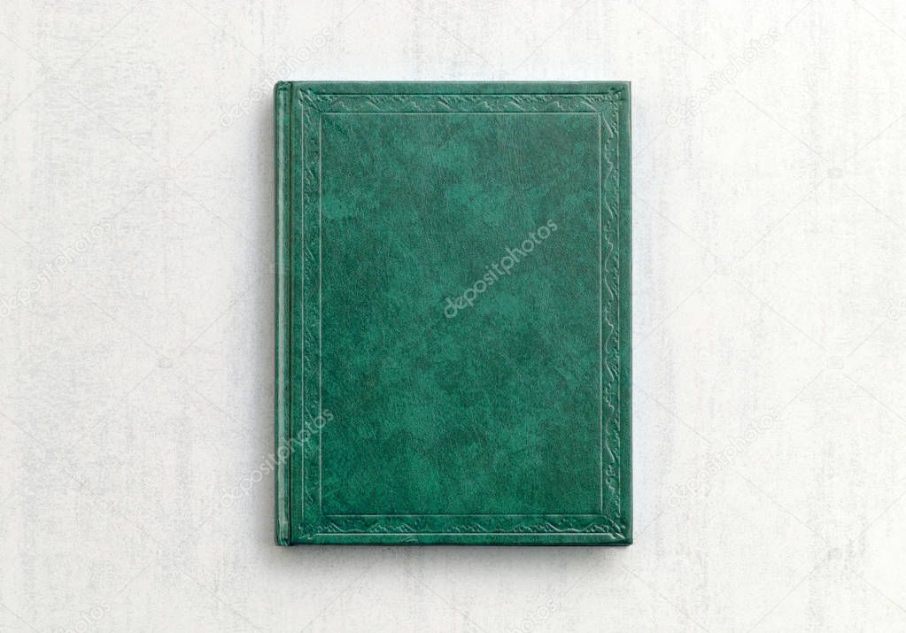 mock up book green color on gray background close-up, top view