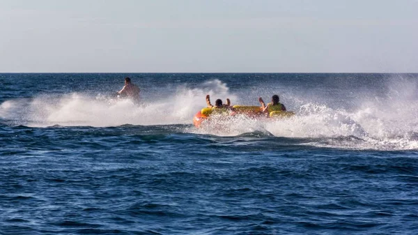 Friends Tourists Having Fun Riding Water Tube Scooter Sea Waves — Stock Photo, Image