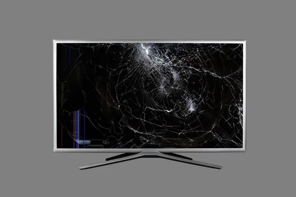 4k Uhd monitörü veya gri arkaplanda izole edilmiş bozuk bir ekranda renkli çizgiler ve çatlaklar olan TV