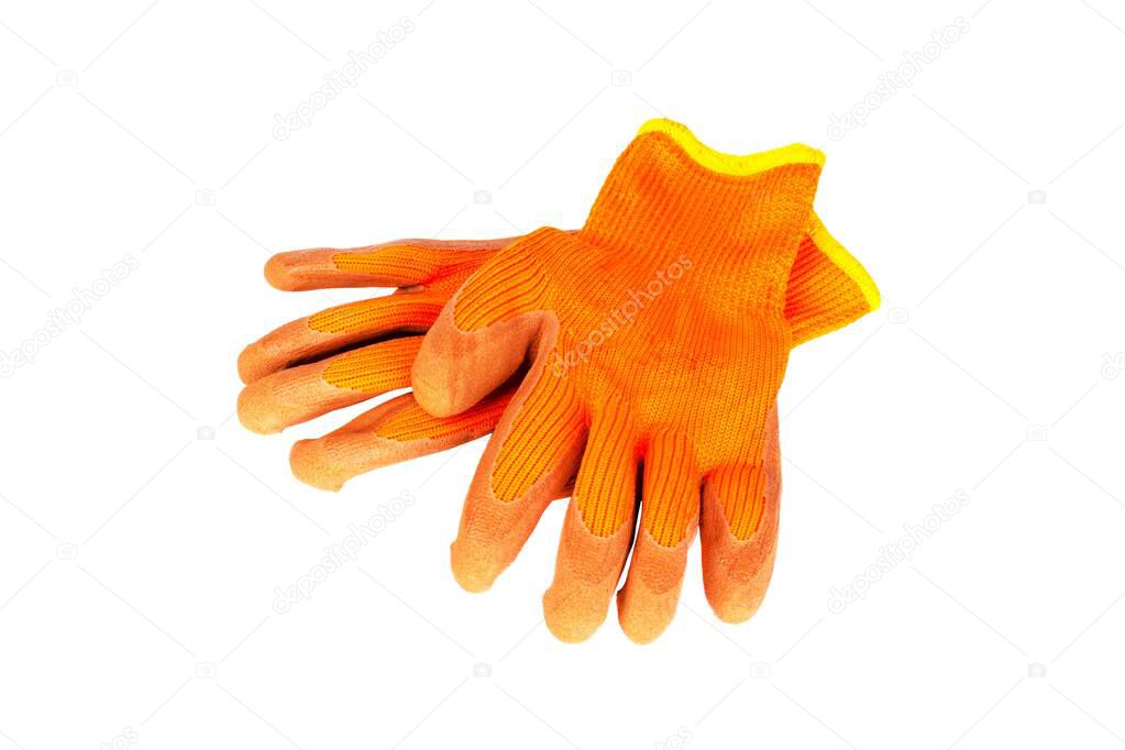 a pair of orange protective gloves for gardening, construction and repair work isolated on a white background