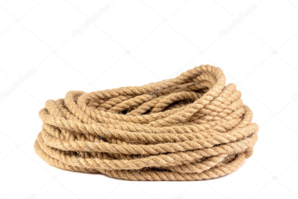 a coil of rope isolated on a white background close up
