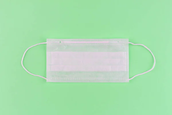 Disposable Medical Mask Green Background Close Concept Shortage Medical Masks — Stock Photo, Image