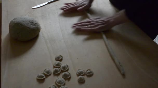 Orecchiette raw homemade blurred and hands — Stock Video