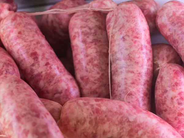 Salsiccia di carne di maiale in un mercato — Foto Stock