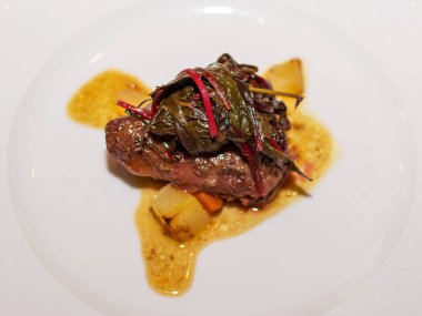 Gremolada soslu Dana buzağı