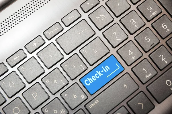 テキストチェックがオンのコンピュータ上の青ボタン — ストック写真