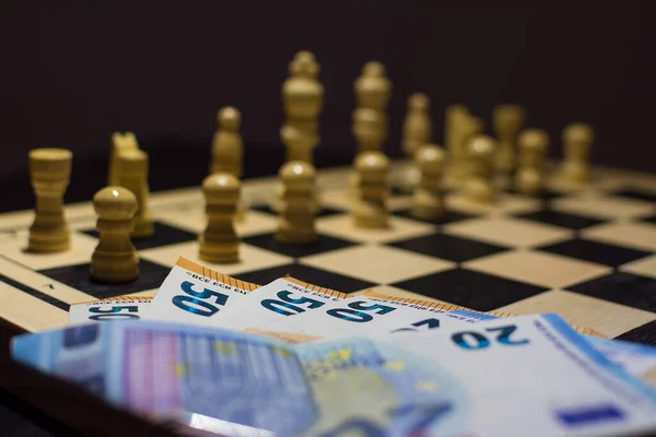 the chessboard ready to start the game and stake on one side.