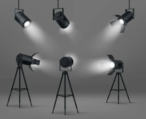 Vector glowing spotlights for studio or stage — Stock Vector