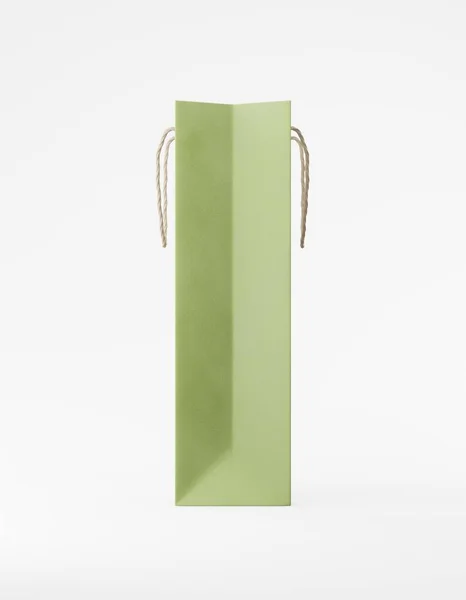 Sac d'emballage écologique papier kraft avec poignée latérale. Grand modèle vert étroit sur fond blanc publicité promotionnelle. rendu 3D — Photo