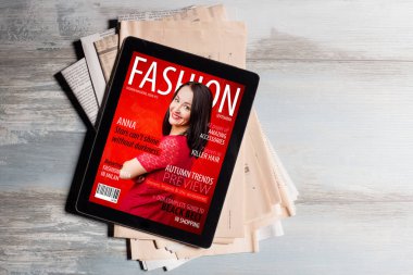 Fashion magazine cover on tablet clipart