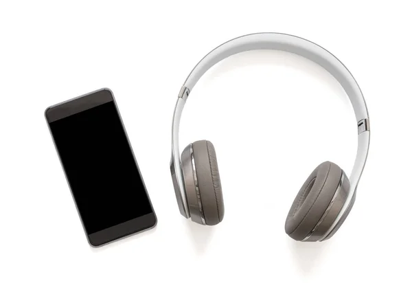 Headphones and mobile phone — Stock Photo, Image