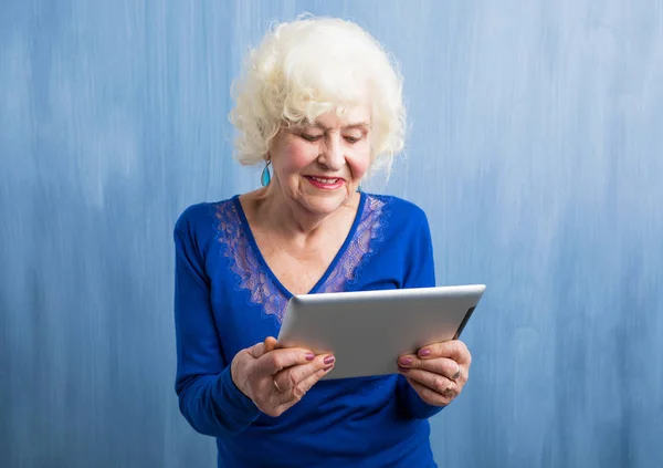 Grandma holding tablet computer — Stock Photo, Image