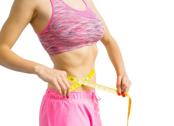 Womna measureing waist with measure tape — Stock Photo, Image