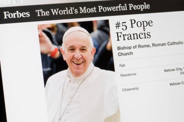 RIGA, LATVIA - February 24, 2017: Forbes Magazine list of The Worlds Most Powerful People.Number 5 the Bishop of Roman Catholic church Pope Francis. clipart
