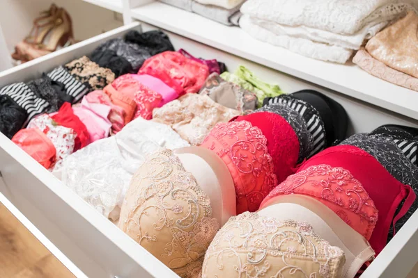 Different color bras in drawer — Stock Photo, Image