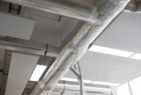 Modern heating pannels on ceiling — Stock Photo, Image