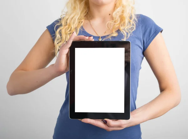 Person holding vertical blank screen tablet — Stock Photo, Image