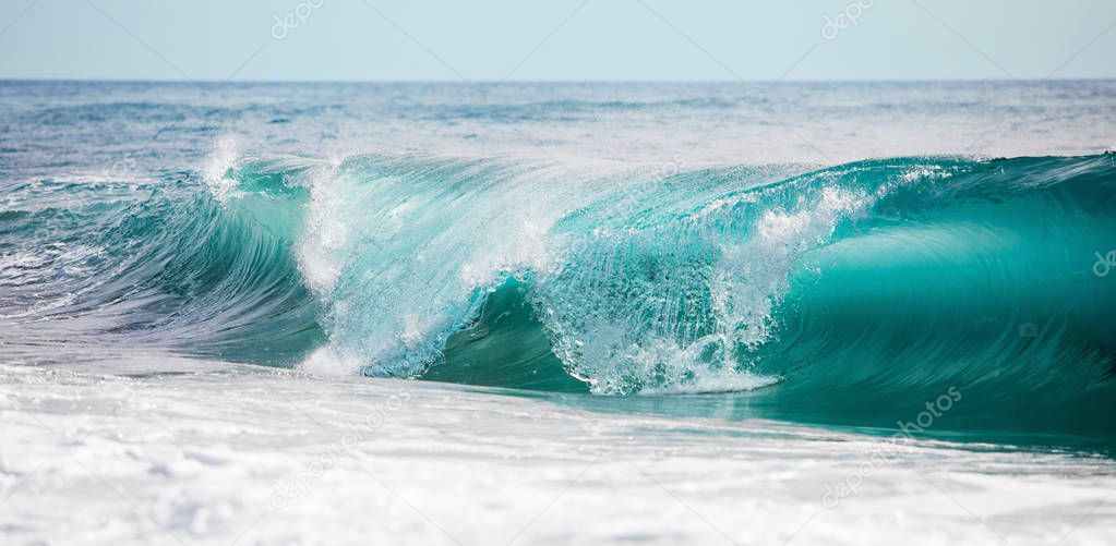 Turquoise blue rolling waves