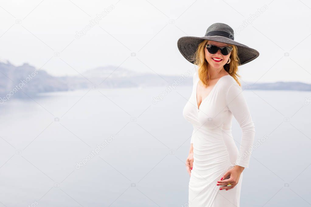 Glamorous woman wearing white dress