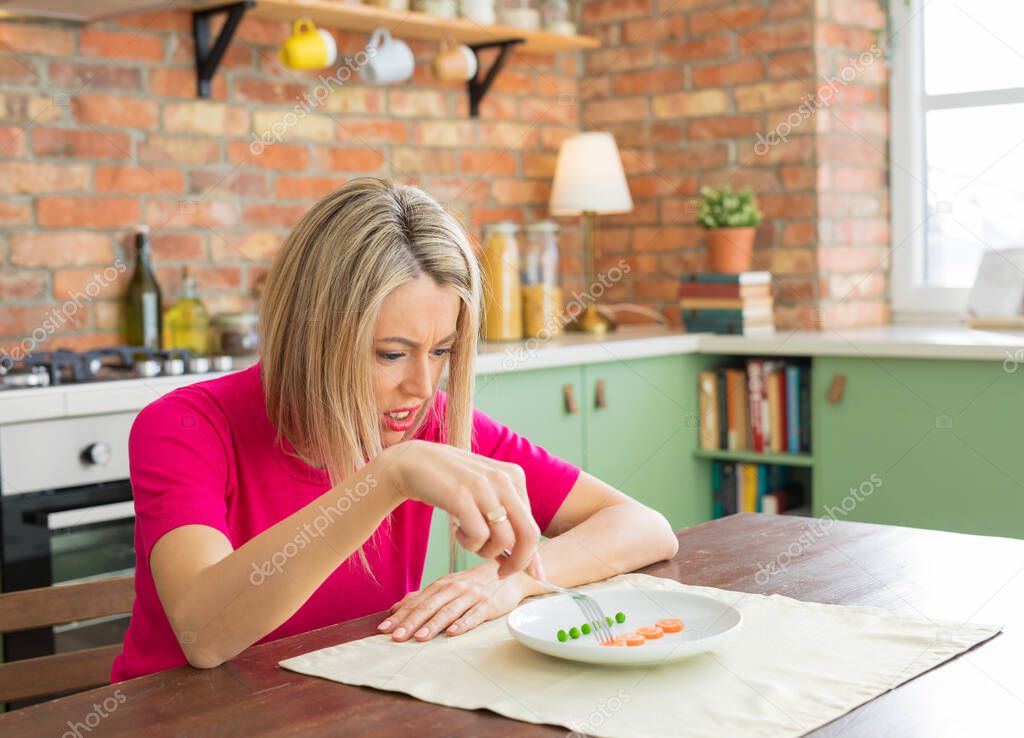 Woman struggling with her diet