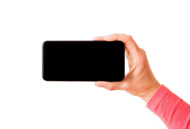 Akıllı telefonu yatay olarak tutan kişi, beyaz arkaplanda izole edilmiş fotoğraf