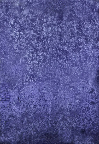 Water and air bubbles over abstract purple background.