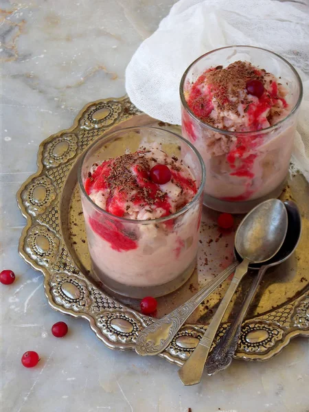 Pink berry ice cream with jam in glasses on a metal dish. Space for text. — Stock Photo, Image