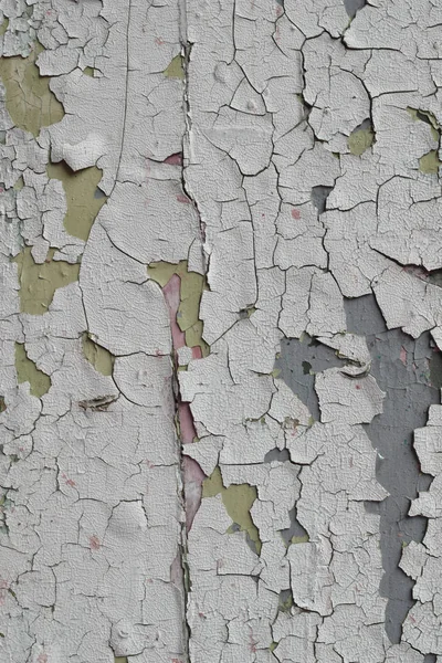 Hintergrund einer alten Holzwand mit abblätternder Farbfläche — Stockfoto