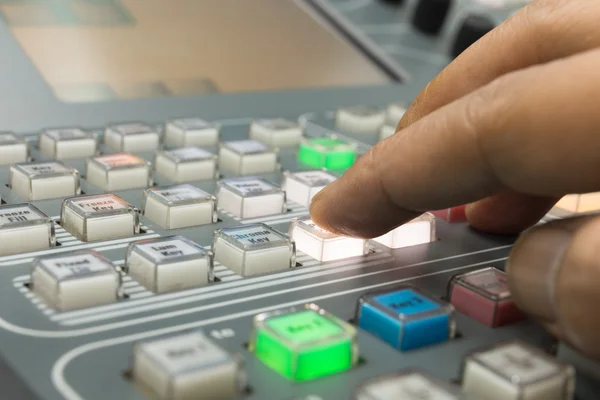 Hands of a cinematographer who worked on the vision mixer, switch the TV panel to the gallery. — Stock Photo, Image