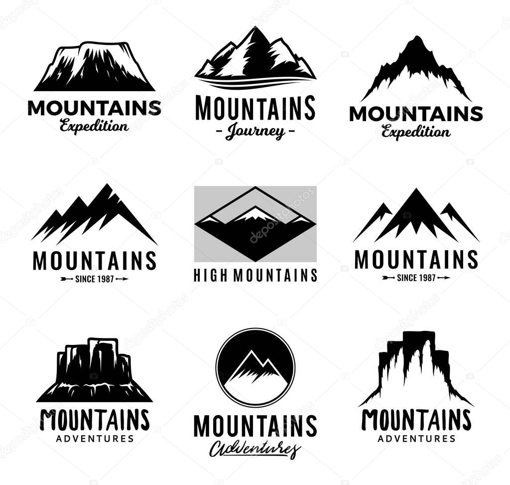 Vector mountains logo isolated on white. Mountains, rocks and peaks icons.
